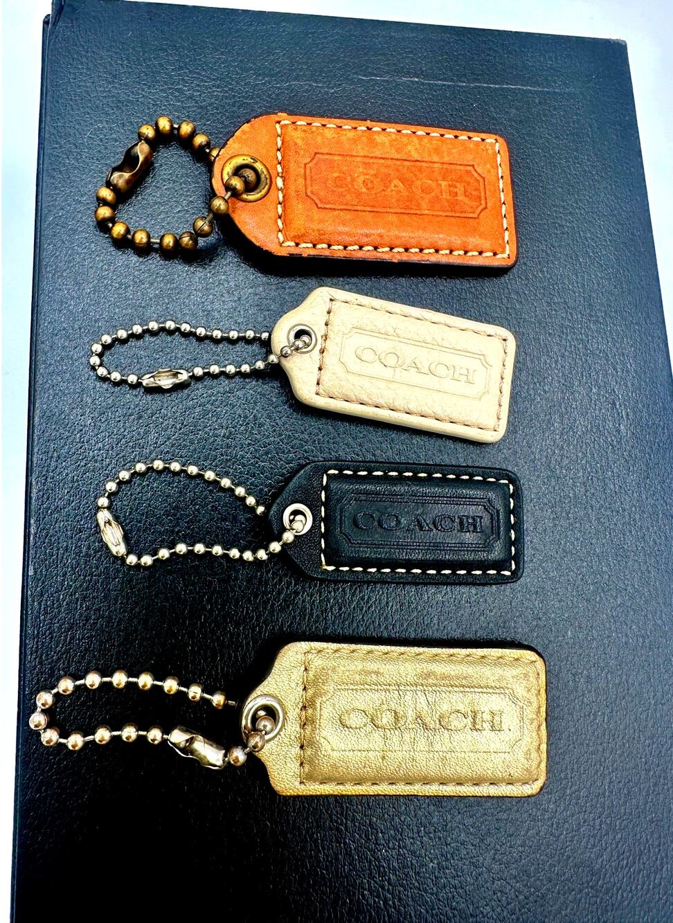 Lot of 4 Coach Leather Hangtags Tan Ivory Black Gold Bag Tags Charms